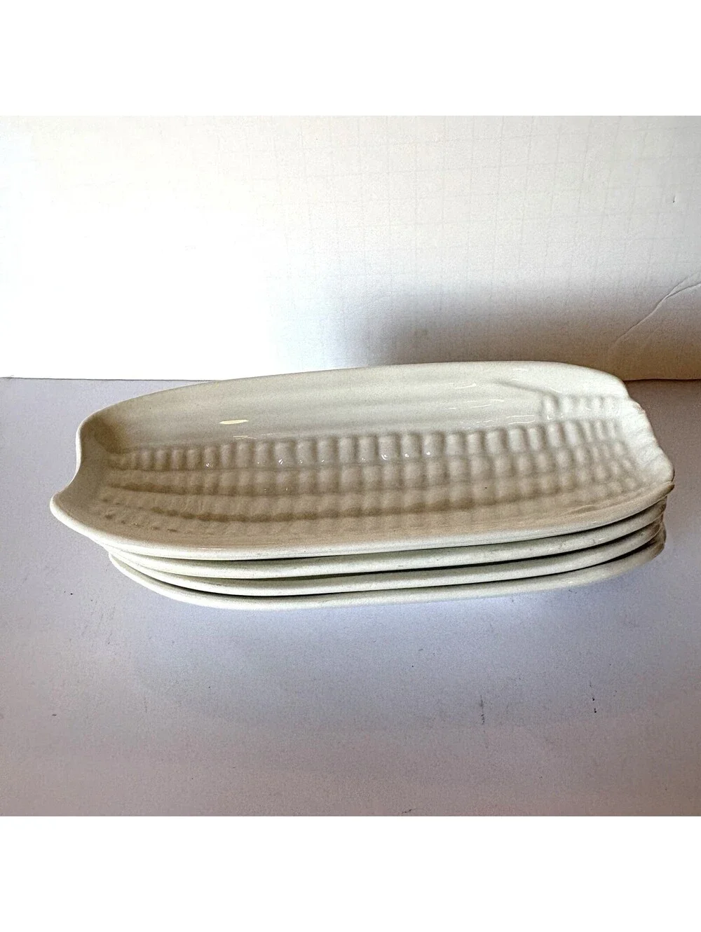WHITE STONEWARE CORN ON THE COB HOLDERS SET OF FOUR
